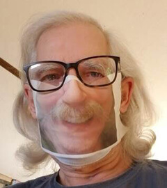 Jack Gillis wearing his selfie-mask covering for manufactured mask